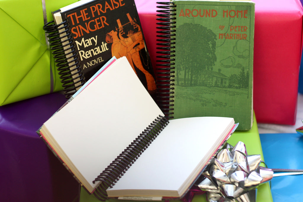 recycled and upcycled notebooks and sketchbooks are repurposed library books that were discard and now have new life