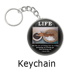 All the art of living lies in the mingling of letting go and holding on. Havelock Ellis quote on funny cat key chain on people power press