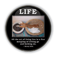 All the art of living lies in the mingling of letting go and holding on. Havelock Ellis quote on funny cat button on people power press