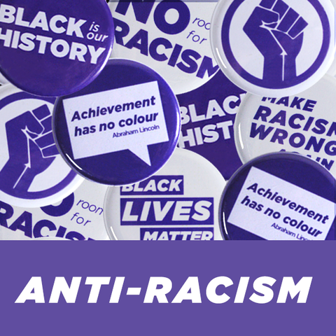 Collection of Anti-Racism buttons and pins from People Power Press