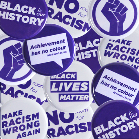 Mix of buttons with Anti-Racism and Black Power designs