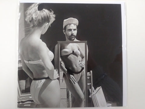 Funny Image of Woman and Man With Mirror